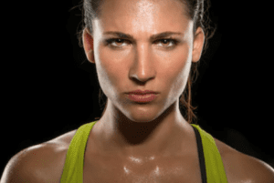What's the Best Protein Powder for Women - female athlete sweating