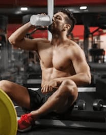 What is a pre workout for - man drinking pre workout