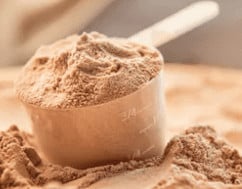 Ancient Nutrition Collagen Review - cup of protein powder