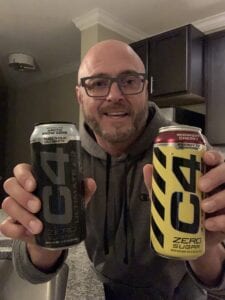 C4 Energy Drink Ingredients - me holding C4 on the go