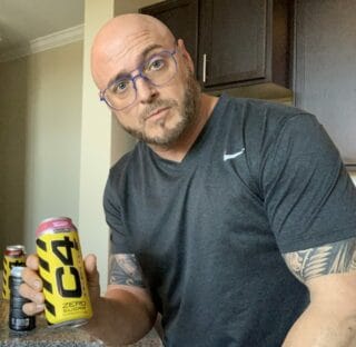 C4 pre workout drink - me holding C4 pre workout drink