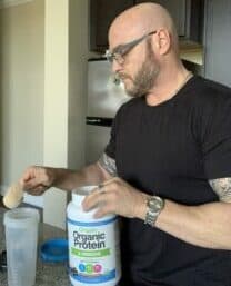 What Is The Best Organic Protein Powder - me mixing orgain organic protein powder