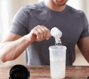 Orgain collagen peptides review - man mixing a drink