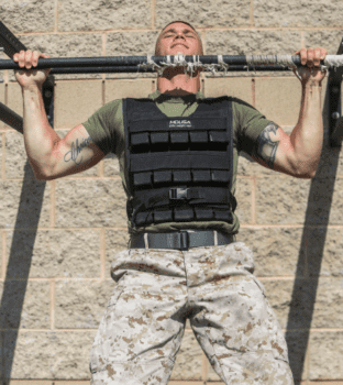 What's A Weighted Vest For - man doing pullup with weight vest